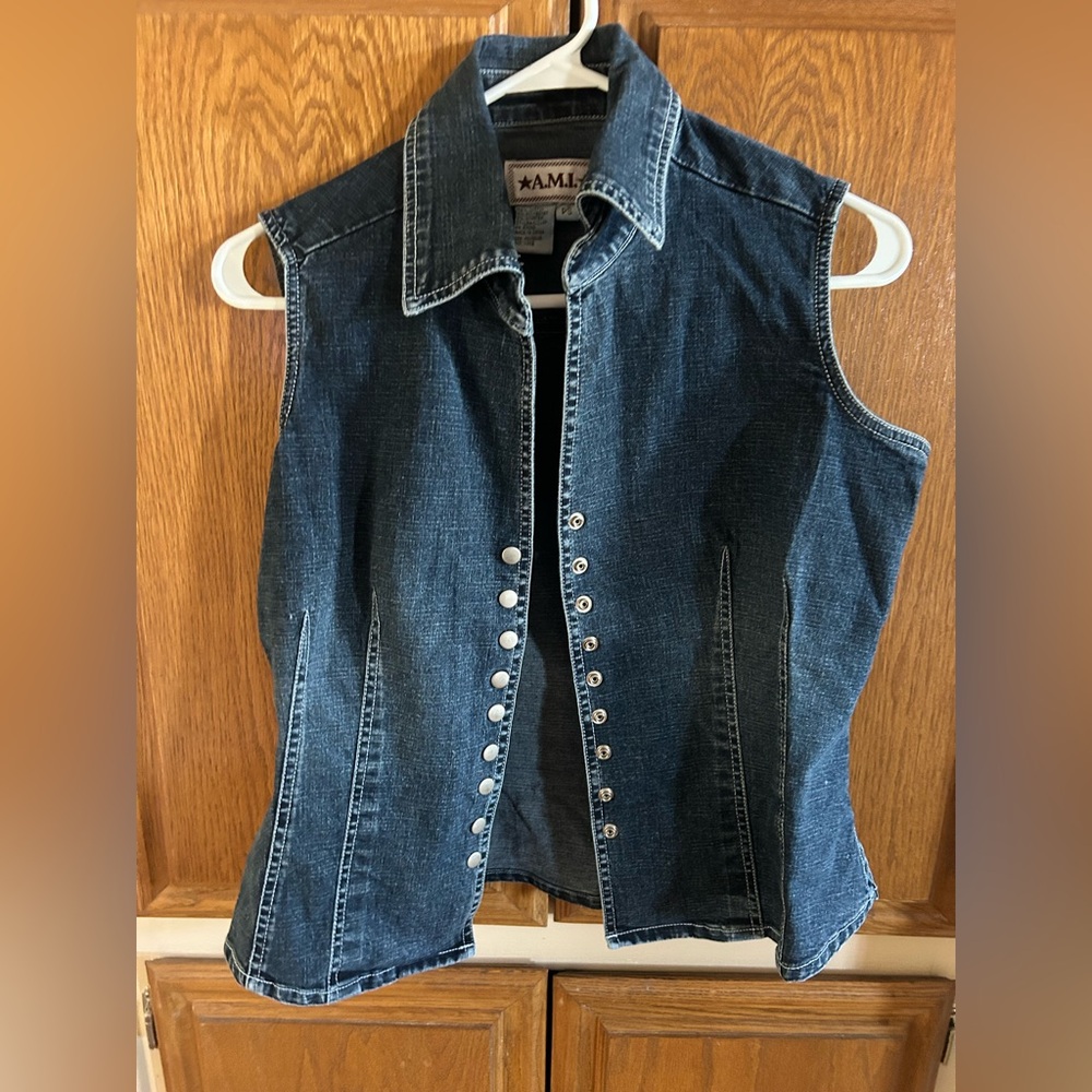 A.M.I.Denim Sleeveless Vest with snap down front.